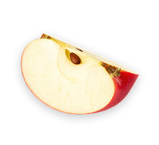 Pomme rouge croquante posée à plat sur fond transparent